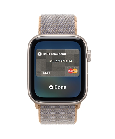 Apple Watch SE 3, aluminum case, starlight color, screen shows Wallet, payment card graphic, right side exterior, Digital Crown dial, Sport Loop band, chambray blue color (light blue-gray)