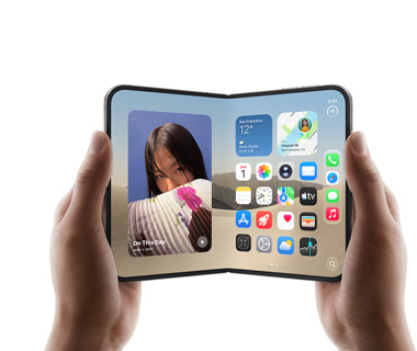 Two hands hold an open iPhone Duo, left screen displays a photo of a woman, right screen shows a home screen with various app icons, including Messages, Photos, Camera, and App Store