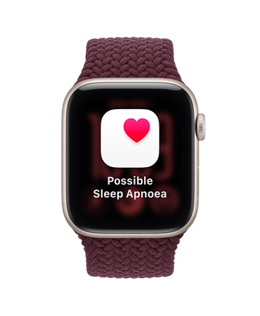 Apple Watch SE 3, screen shows possible sleep apnea notification, aluminum case, starlight color, right side exterior, Digital Crown dial, connected to Braided Sport Loop band, burgundy color