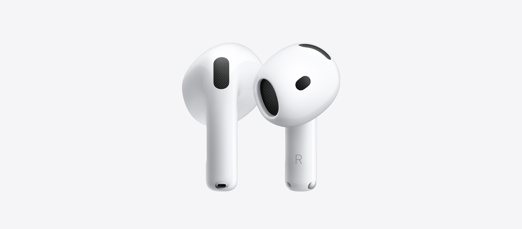 AirPods 5: หูฟังไร้สาย, สีขาว, รูปทรงวงรี, จุกหูฟังพร้อมตาข่ายลำโพงอะคูสติกภายใน, ก้านสั้นพร้อมหัวต่อชาร์จสีเงิน, ตัวอักษรระบุข้างซ้ายและข้างขวา