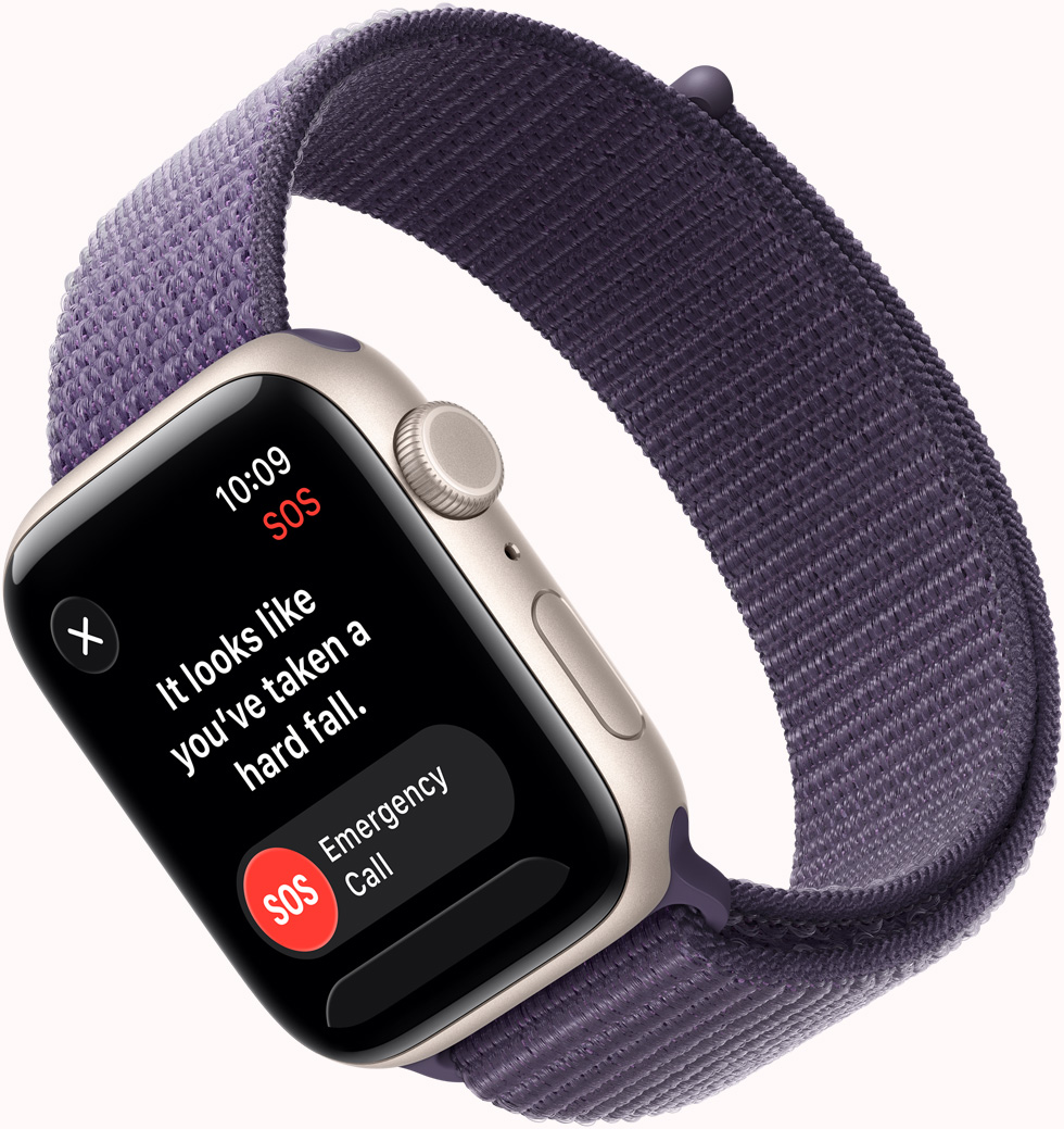 Apple Watch SE 3, алуминиев корпус, астро бяло, SOS Разпознаване на падане известие, външни, странични бутони отдясно за спешно повикване и I'm OK, Digital Crown, микрофон, страничен бутон, каишка, Sport Loop, цвят лилава мъгла