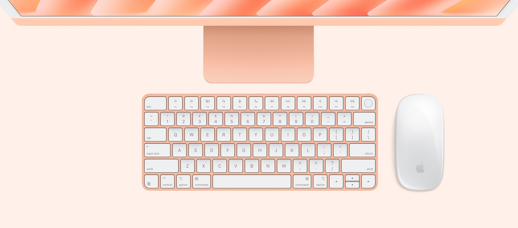 Άνω όψη του πορτοκαλί iMac με ποντίκι και πληκτρολόγιο που ταιριάζουν χρωματικά