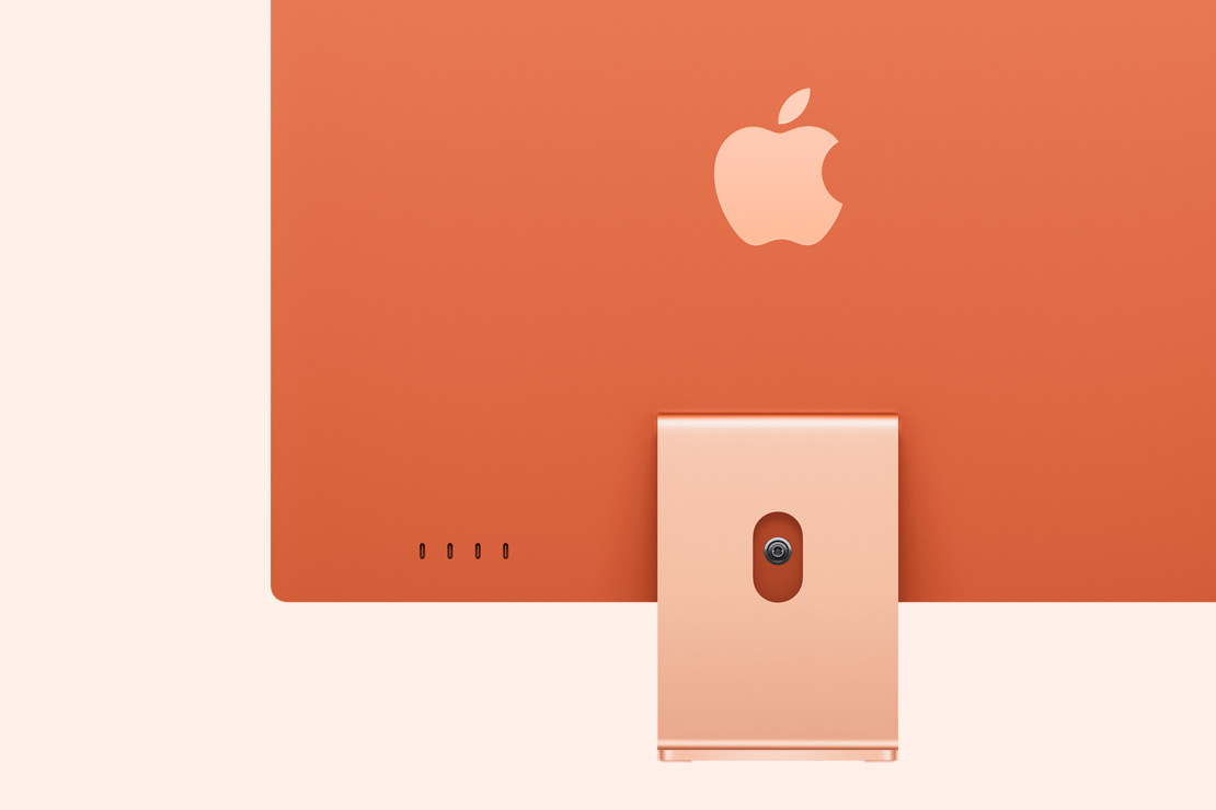 Πίσω όψη του πορτοκαλί iMac που δείχνει τις 4 θύρες USB‑C