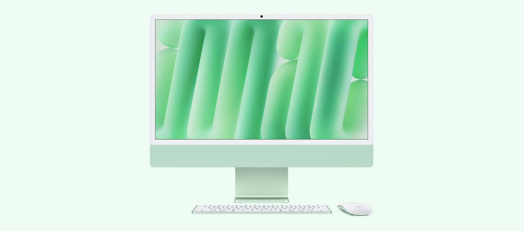 Μπροστινή όψη του πράσινου iMac με ποντίκι και πληκτρολόγιο που ταιριάζουν χρωματικά
