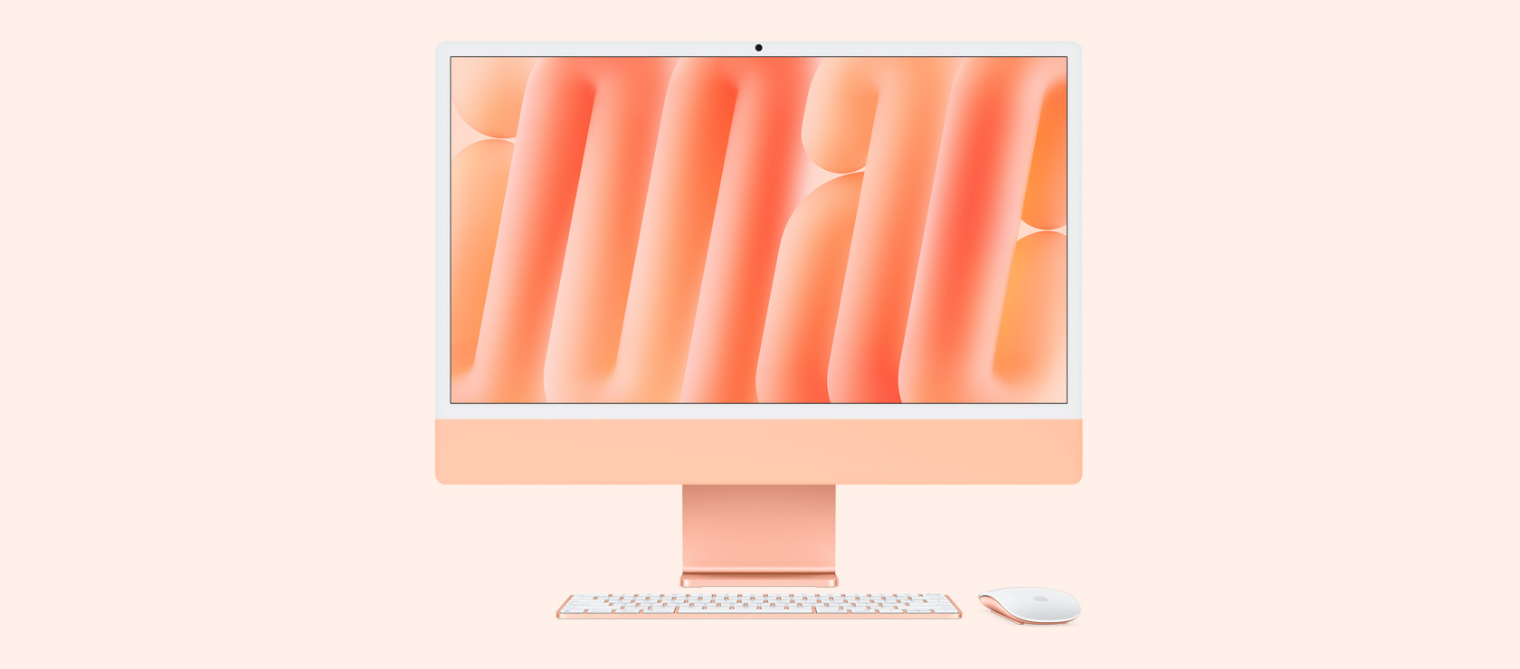 Μπροστινή όψη του πορτοκαλί iMac με ποντίκι και πληκτρολόγιο που ταιριάζουν χρωματικά