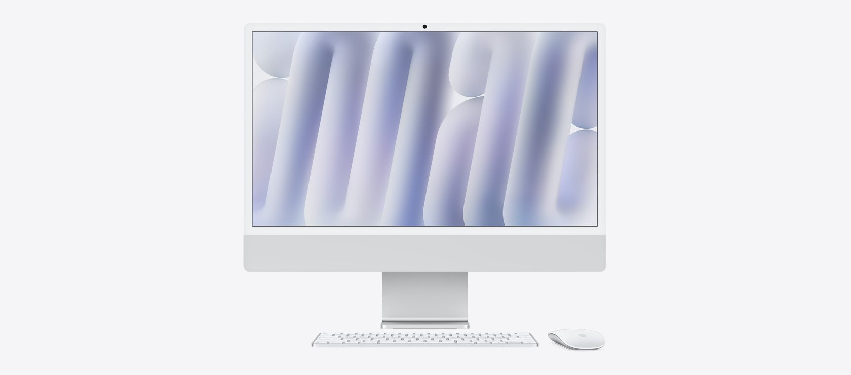 Μπροστινή όψη του ασημί iMac με ποντίκι και πληκτρολόγιο που ταιριάζουν χρωματικά