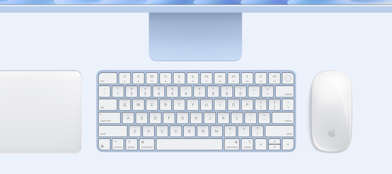 Άνω όψη του iMac με Magic Trackpad, πληκτρολόγιο και ποντίκι