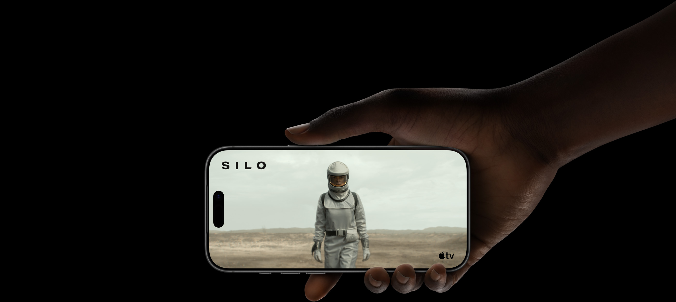 A scene from the Apple TV+ series Silo demonstrates the extended battery life of iPhone 17 Pro