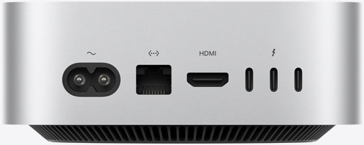 Πίσω όψη του ασημί Mac mini που δείχνει τις πίσω θύρες: μία θύρα τροφοδοσίας, μία θύρα Ethernet, μία θύρα HDMI και τρεις θύρες Thunderbolt.