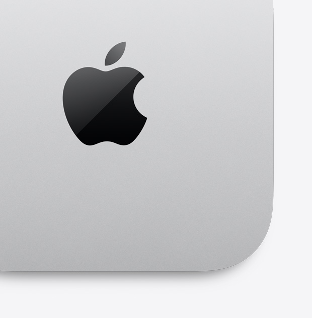 Από πάνω προς τα κάτω όψη ενός ασημί Mac mini με το λογότυπο της Apple